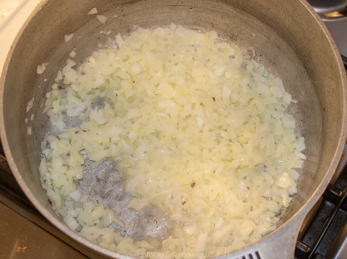 sauteing onions in butter is a frying pan