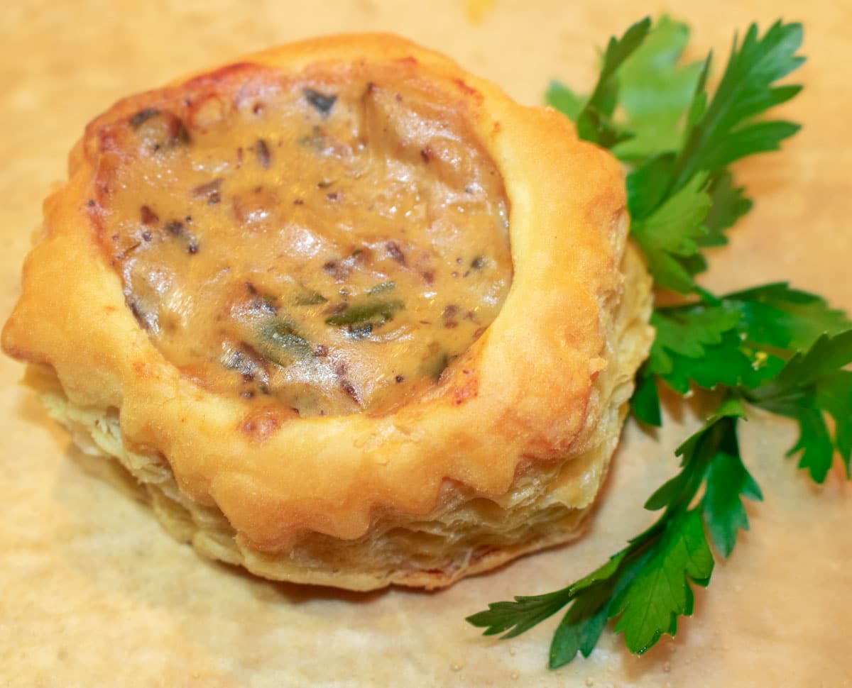 oyster pattie with parsley garnish