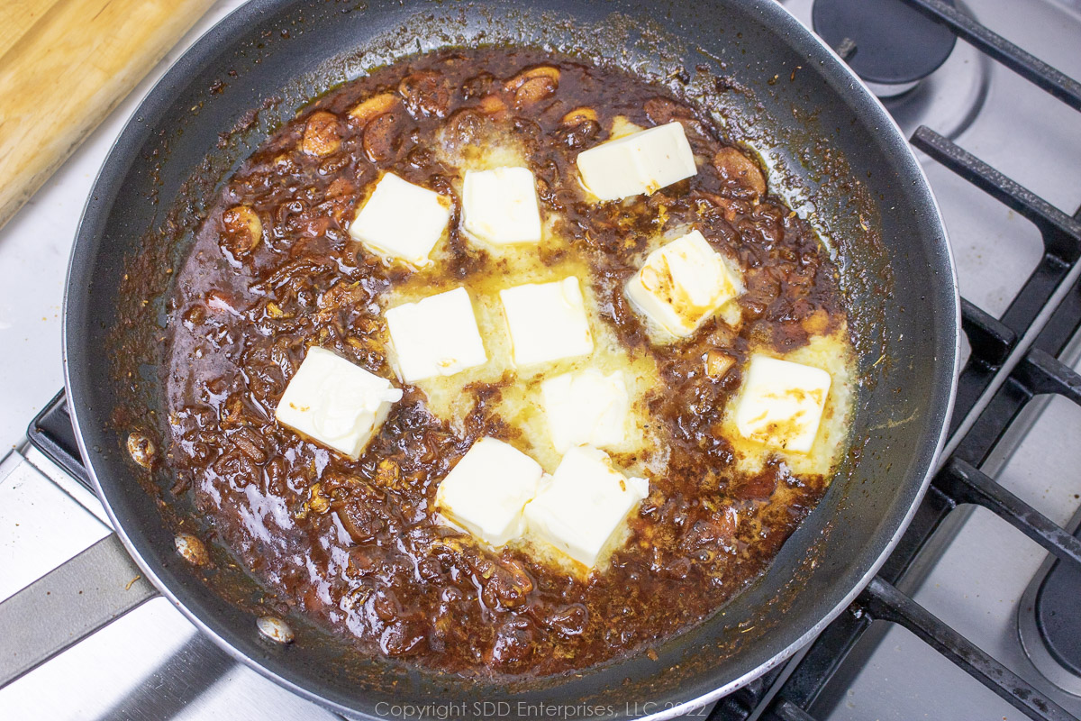 butter added to sauce in a sauté pan