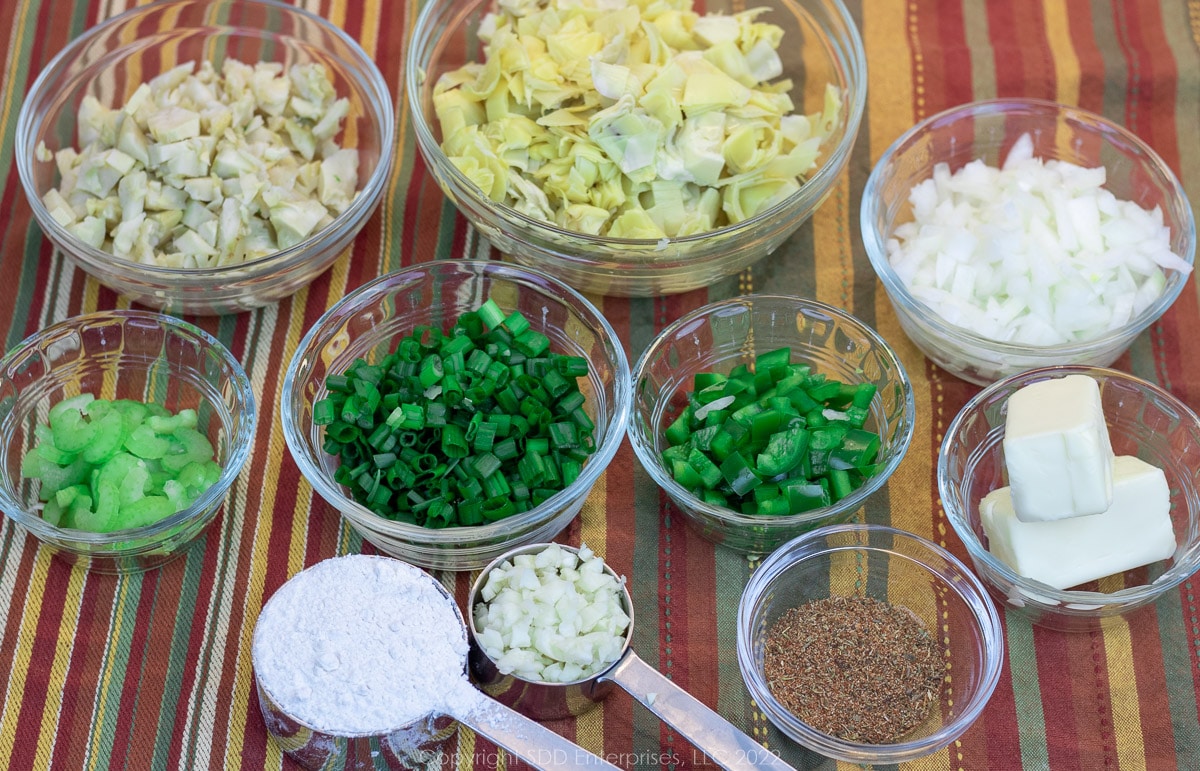prepared ingredieents in prep bowls for bisque