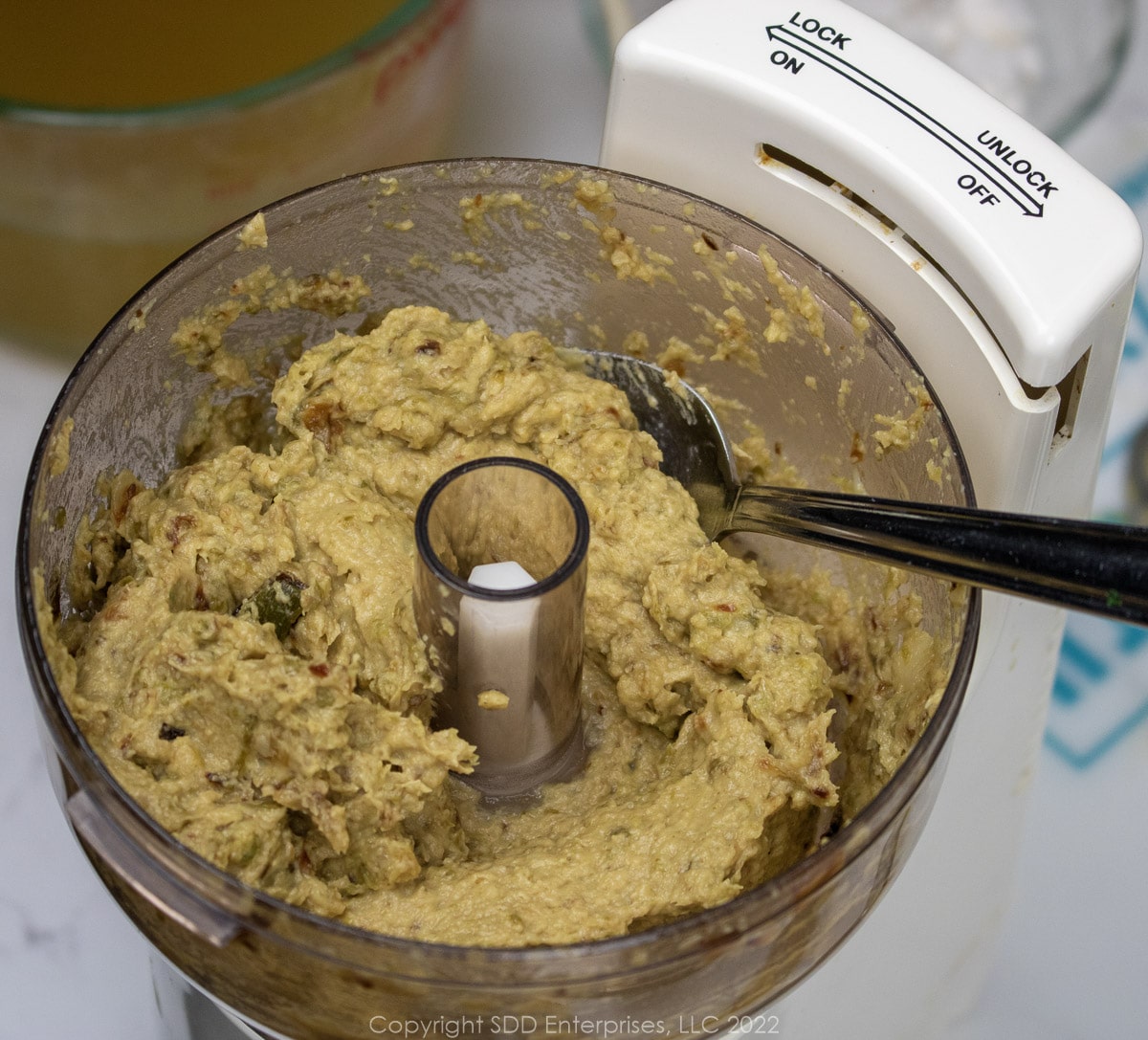 pureed sautéed vegetables in a small food processor