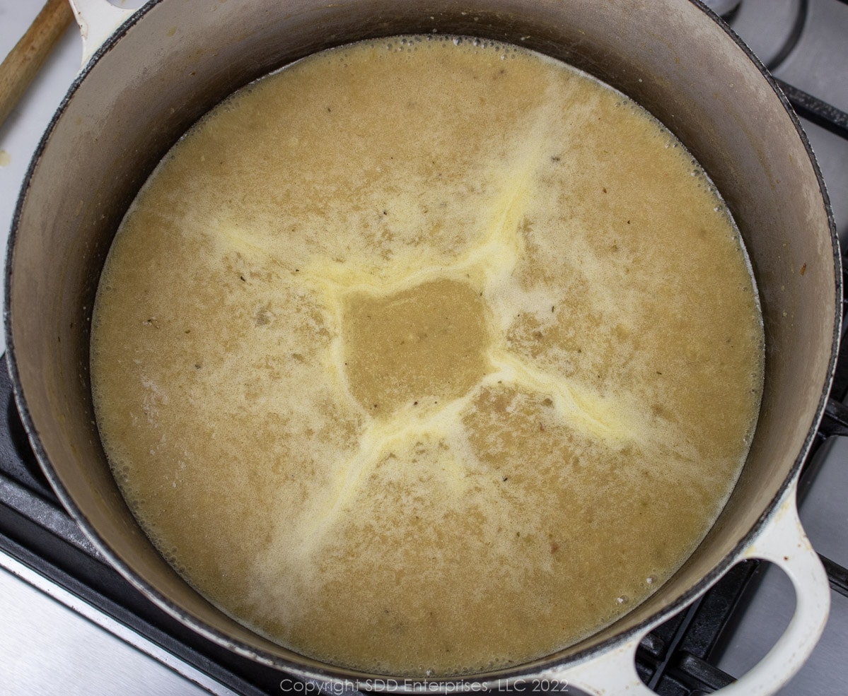 simmering stock for bisque in a Dutch oven