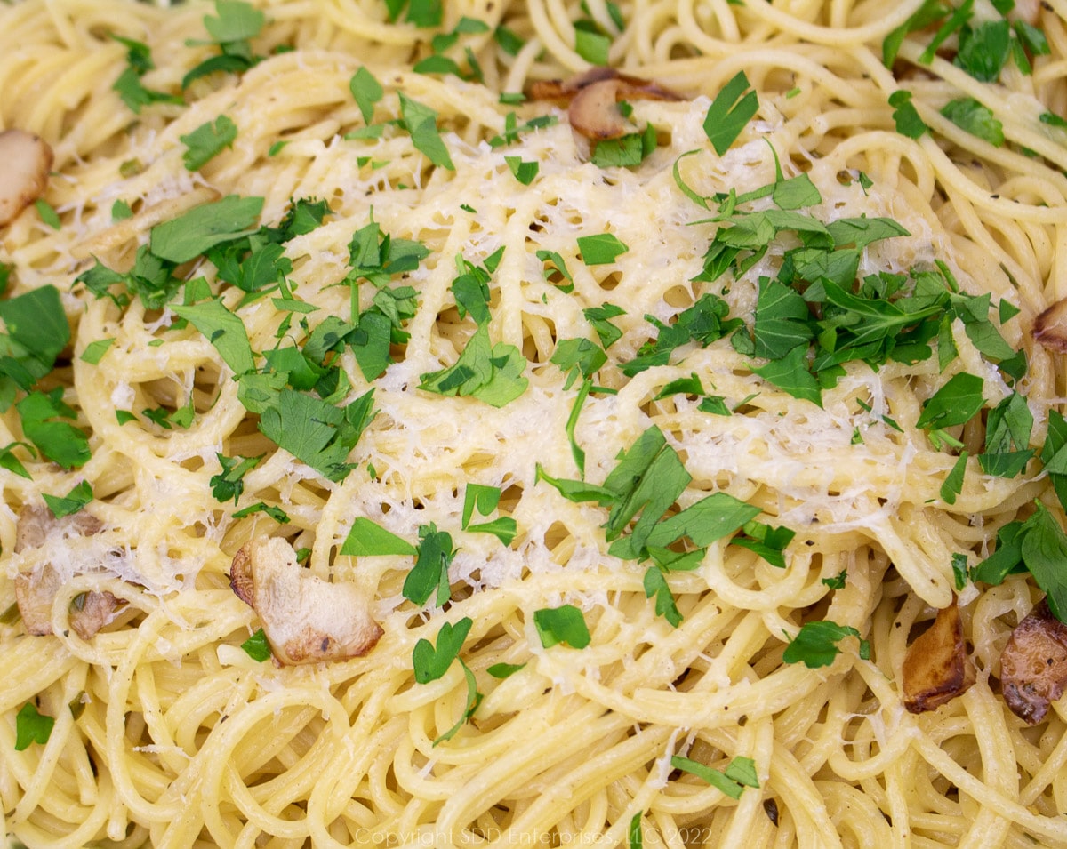 spaghetti Bordelaise with parsley garnish