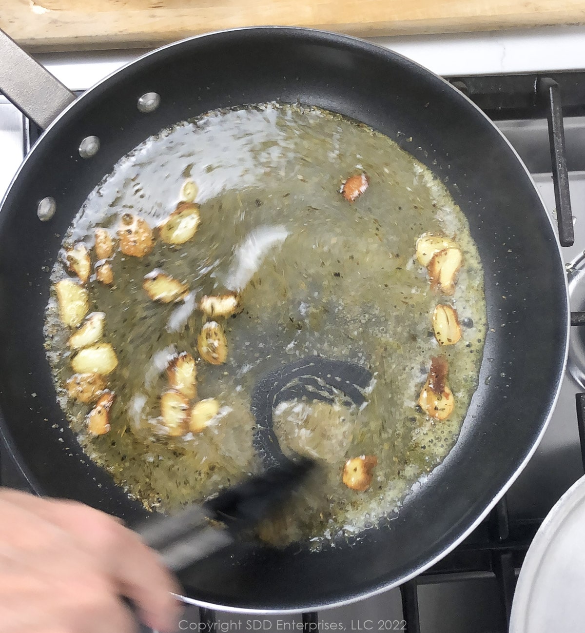 garlic browning in utter in a sauté pan