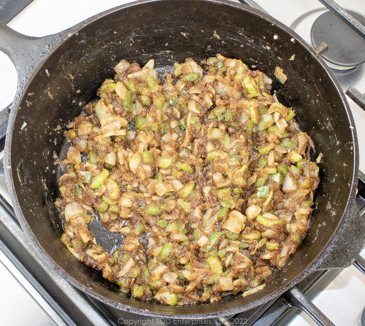 sauted onions, celery and bell peppers in a dutch oven