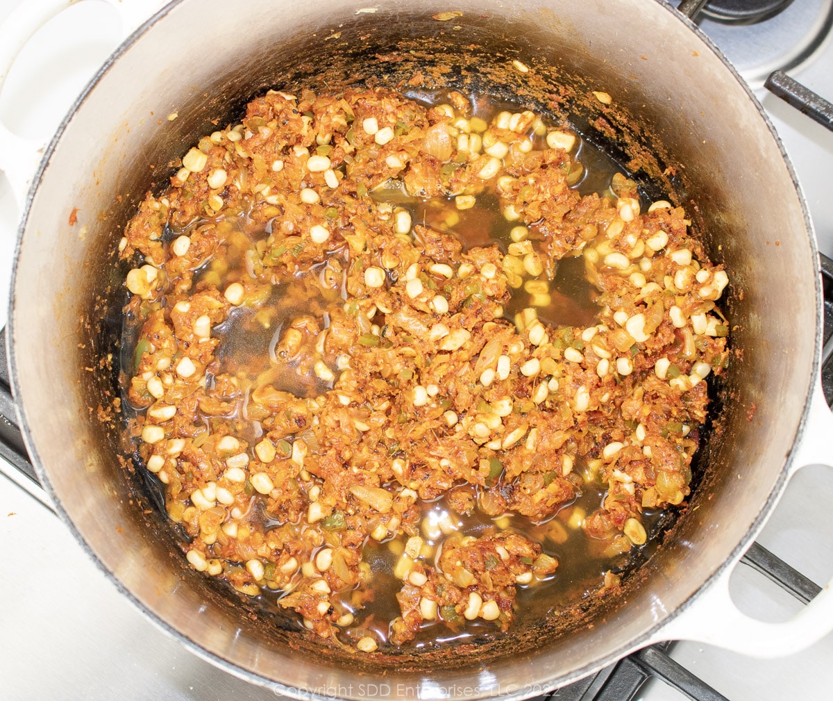 deglazing the Dutch oven with stock