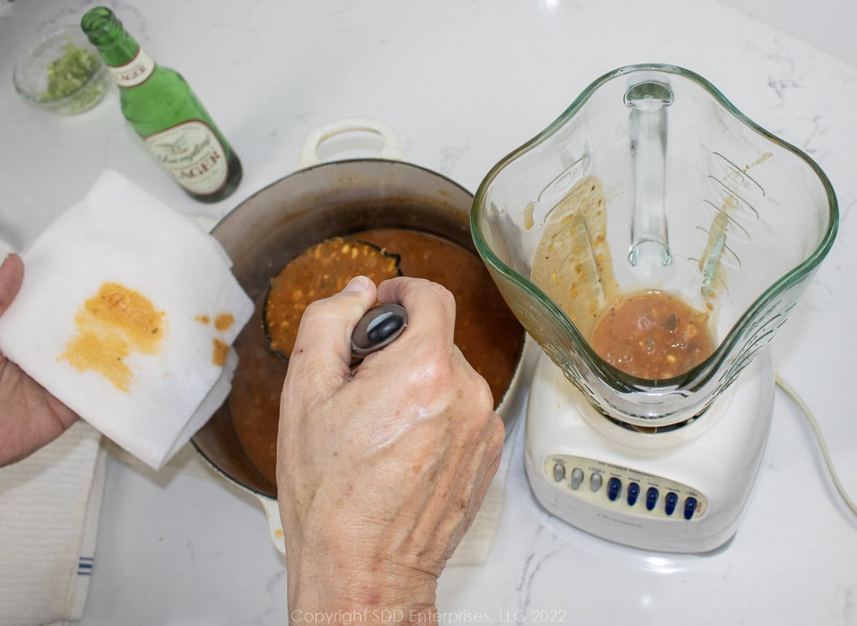 adding bisque to a blender