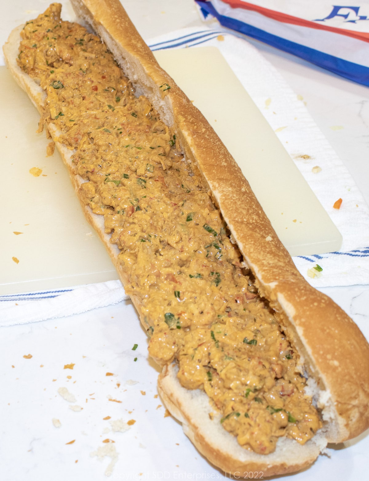 crawfish filling on a loaf of French bread