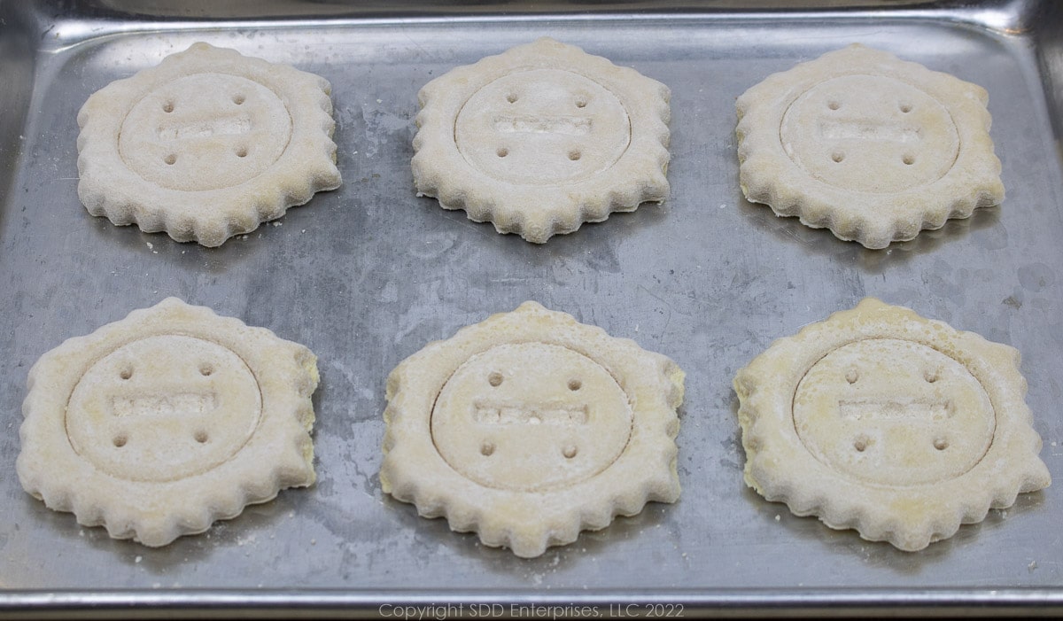 unbaked puff pastry on a baking sheet