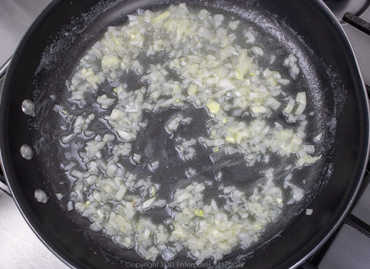 sauteeing onions in utter in a saute pan