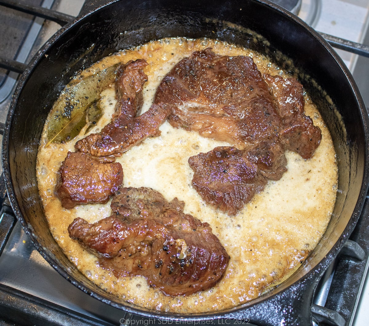 braising beef chuck roast in a Dutch oven