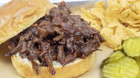 bbq beef sandwich on a brioche roll