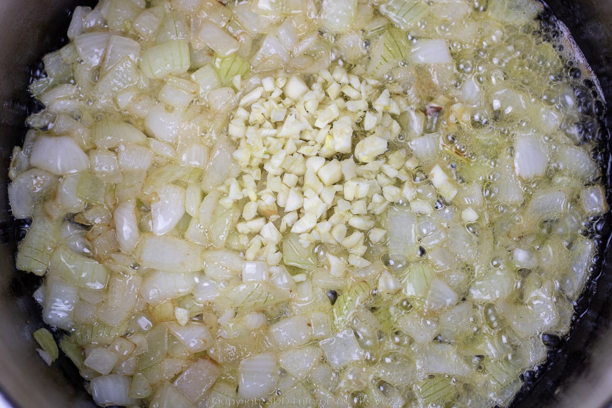 garlic and onions sautéing in butter