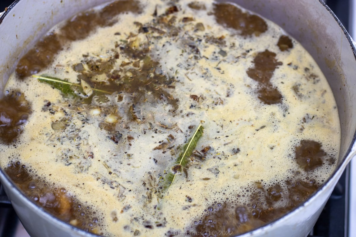 simmering stock in a Dutch oven