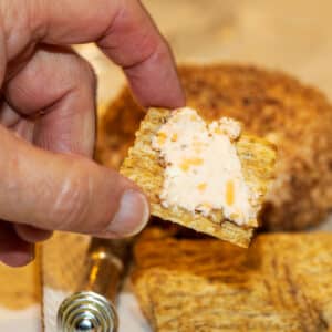 cheese ball spread on a cracker