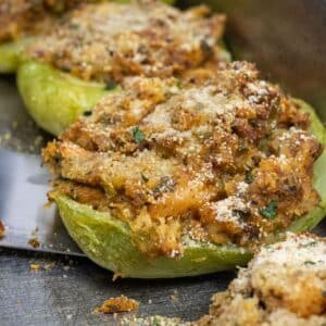 stuffed mirlitons on a serving platter