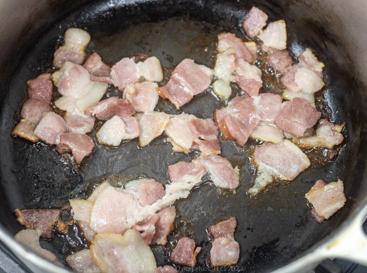 bacon frying in a Dutch oven