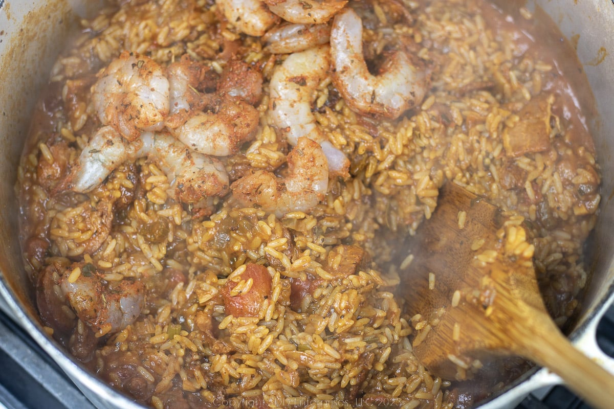 Shrimp added to the cooking jambalaya