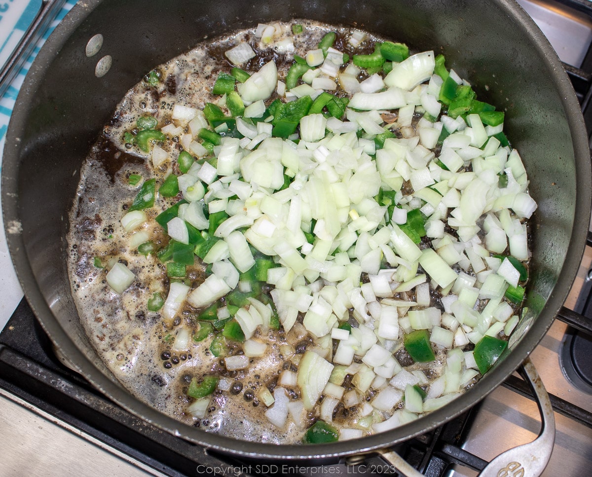 the trinity added to butter in a dutch oven