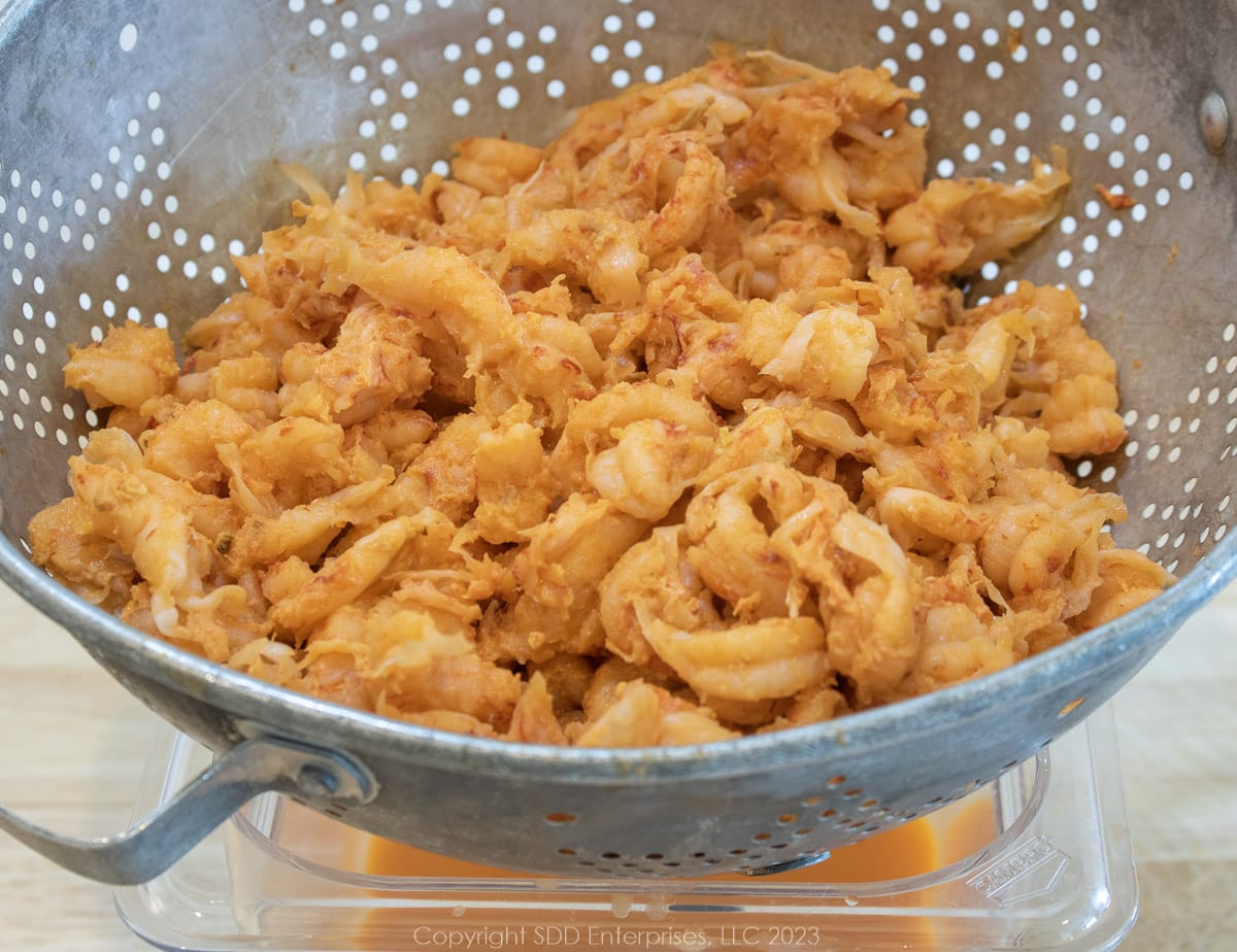 crawfish tails in a colander