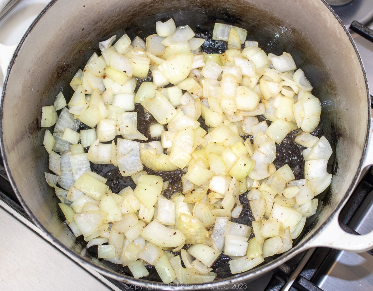yellow onions frying in bacon grease