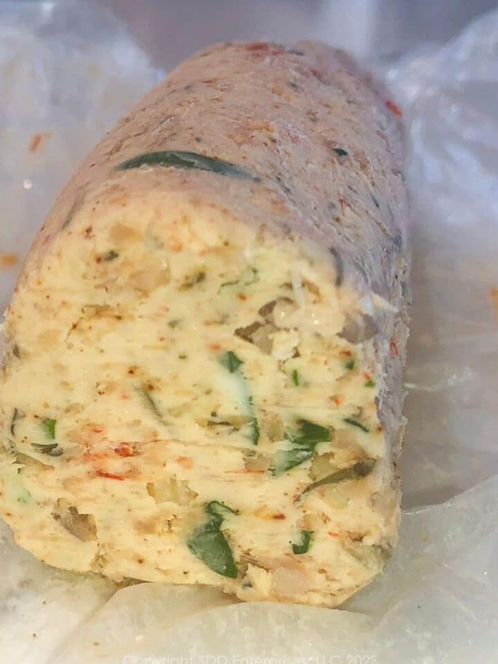 cut end of a roll of crawfish compound butter