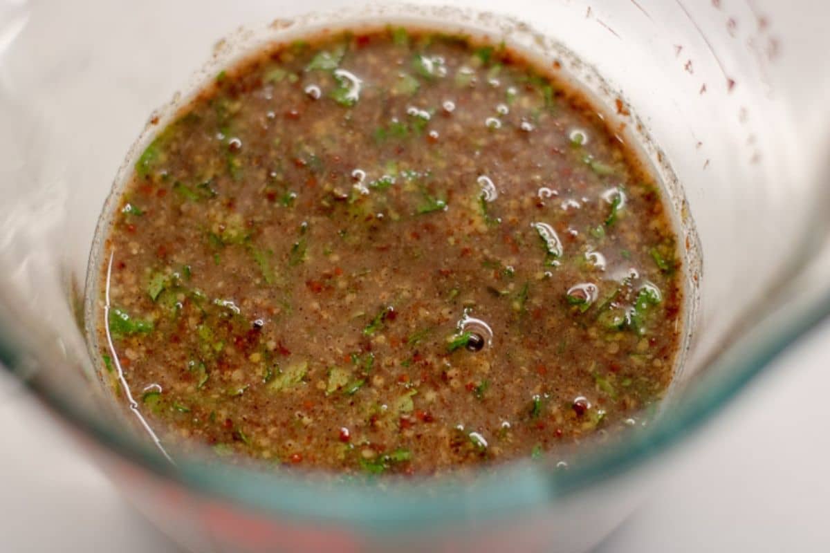 Combined marinade ingredients in a large bowl