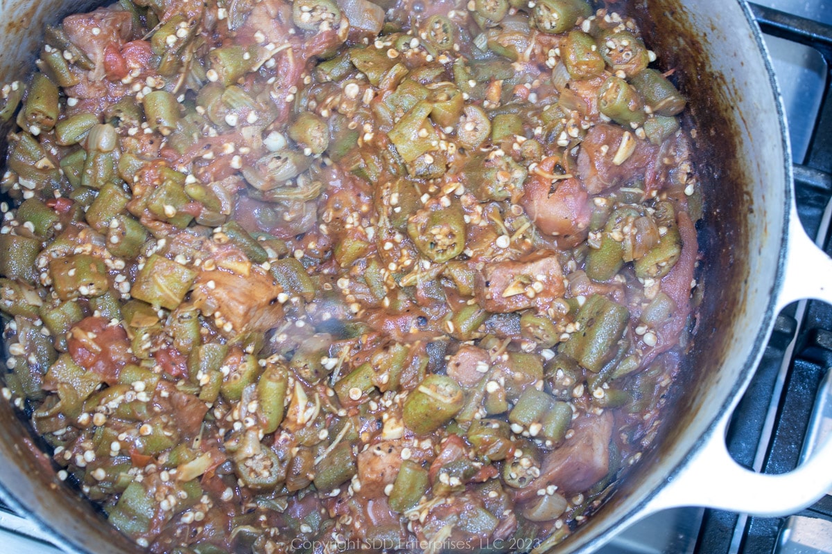 smothered okra and tomatoes in a Dutch oven