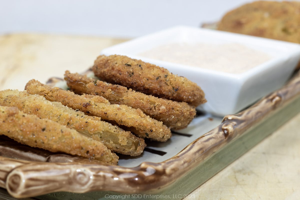 Fried Green Tomatoes with Remoulade Sauce on a serving platter