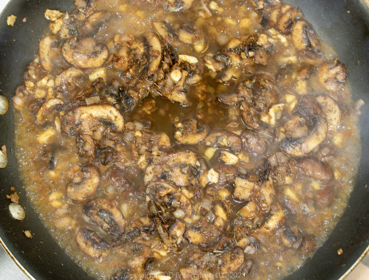 dry sherry added to seasoned, sautéed mushrooms.