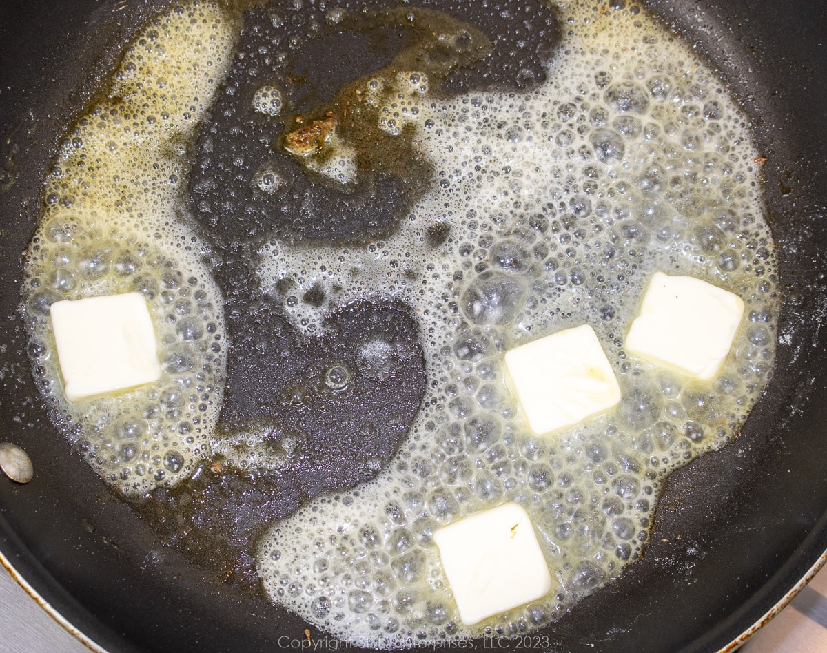 butter melting in a skillet