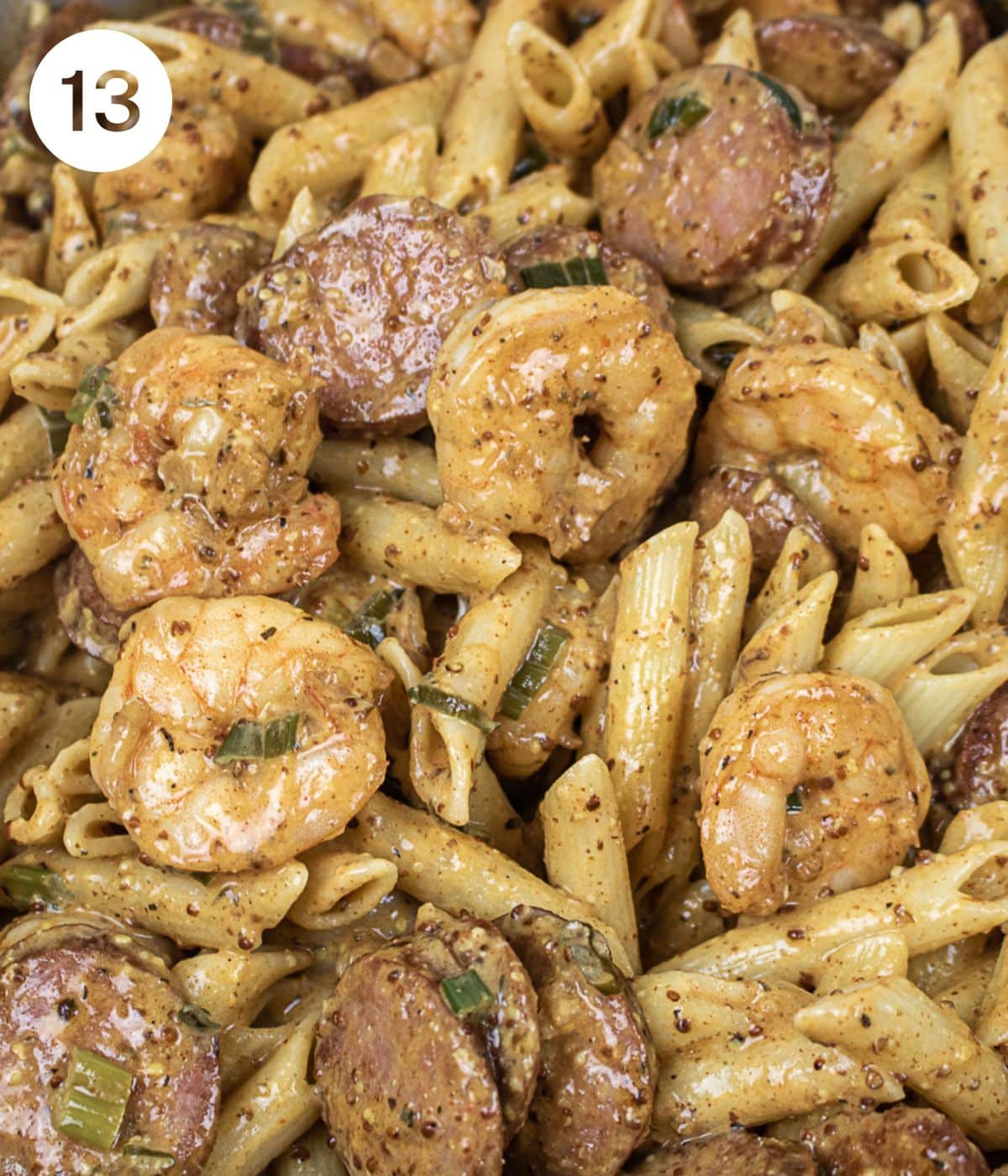 Steps to prepare shrimp and andouille pasta.