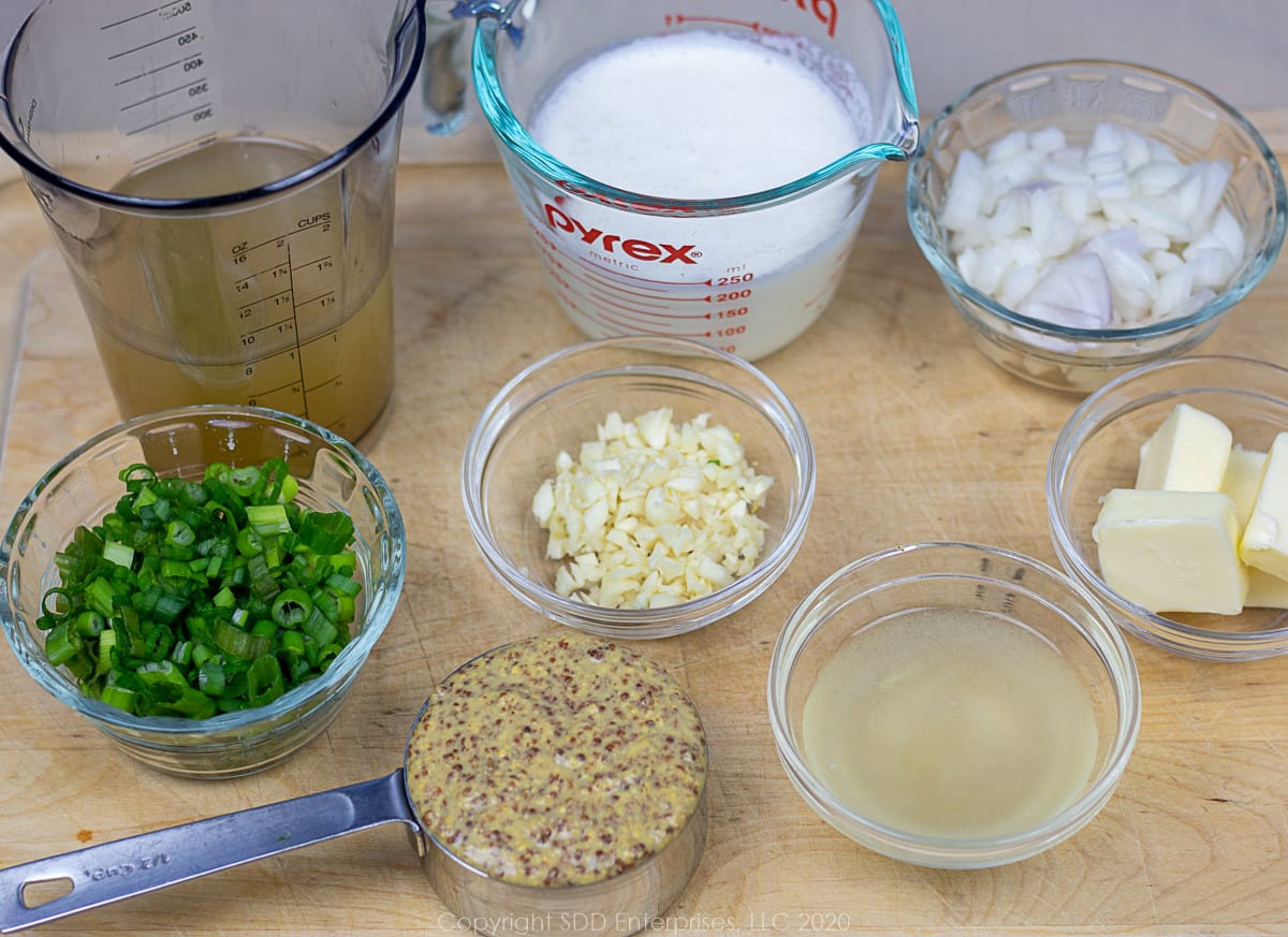 prepared ingredients for shrimp and andouille  pasta.