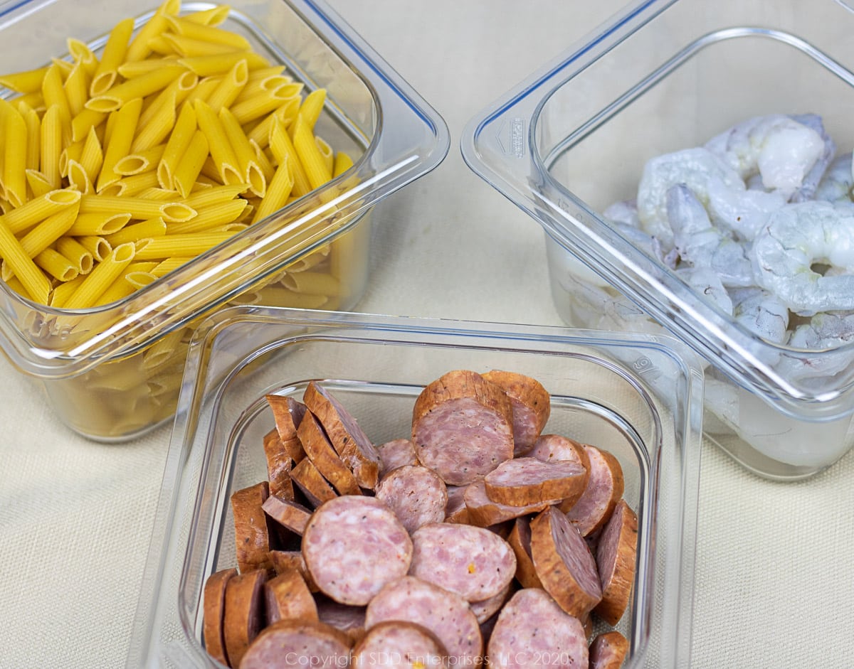 prepared ingredients for shrimp and andouille  pasta.
