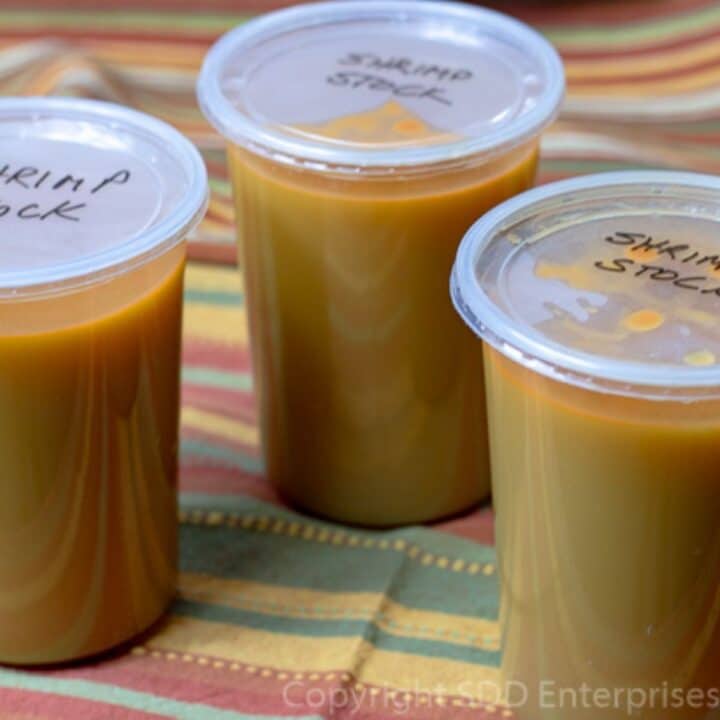 Homemade shrimp stock in freezer containers.