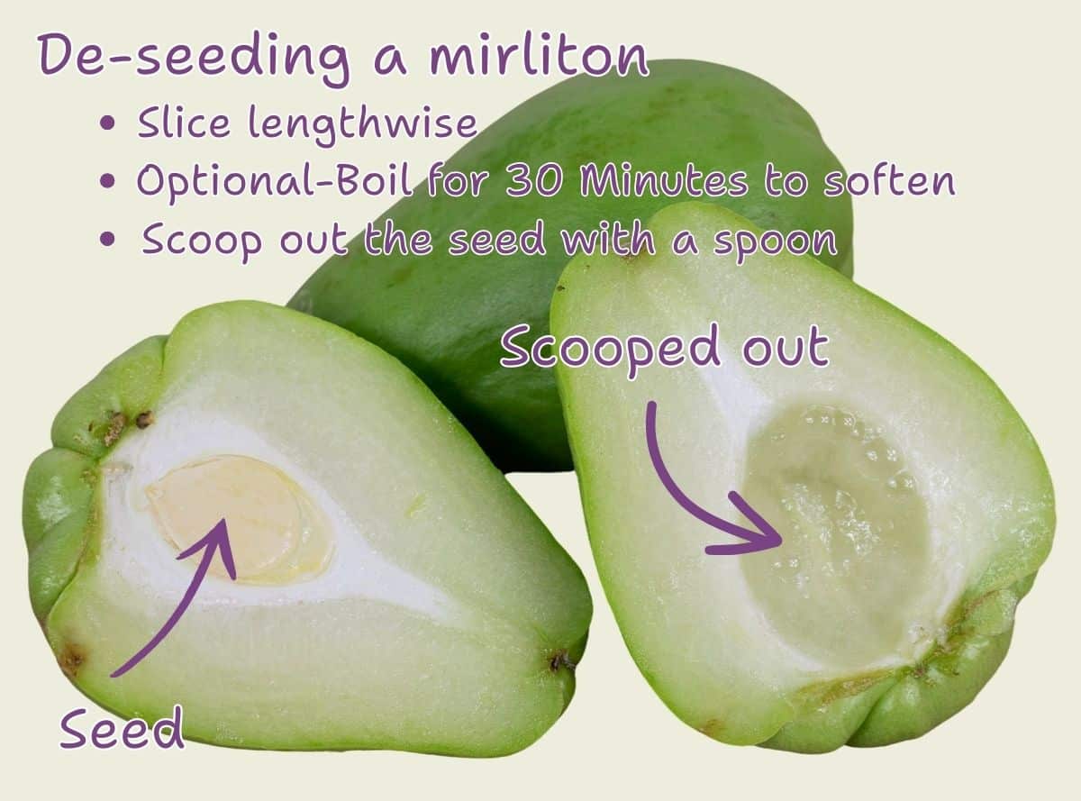 Removing the seed from a mirliton.