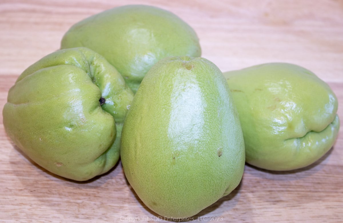 Four mirlitons or chayote squash.