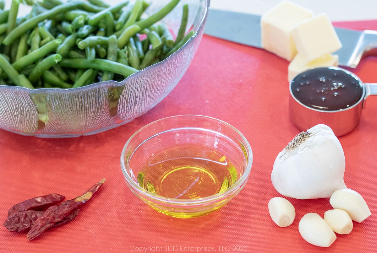 Prepared ingredients for sautéed green beans.