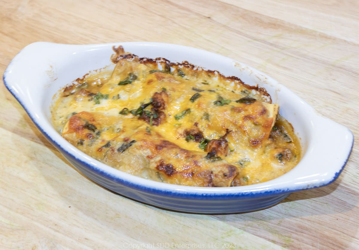 Crawfish Enchiladas in a gratin baking dish.