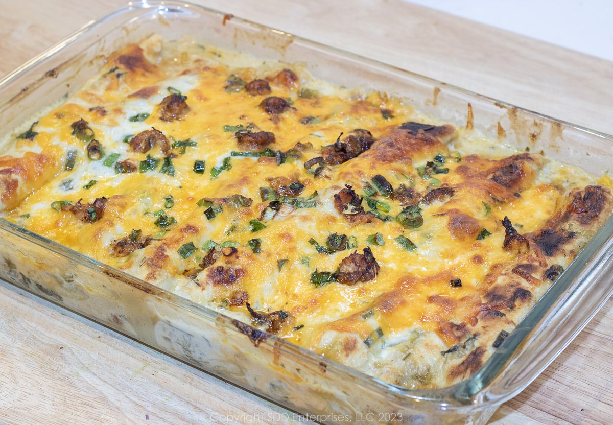 Baked Crawfish Enchiladas in a baking dish.