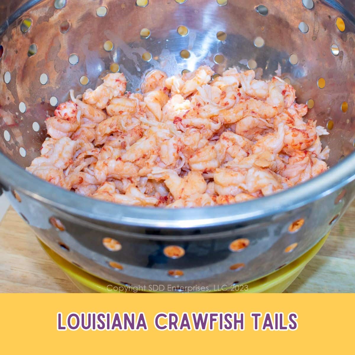 Crawfish tails in a colander.