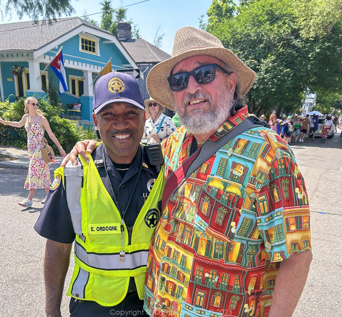 Police Officer Edward Ordogne and me outside the Jazz Fest gates.