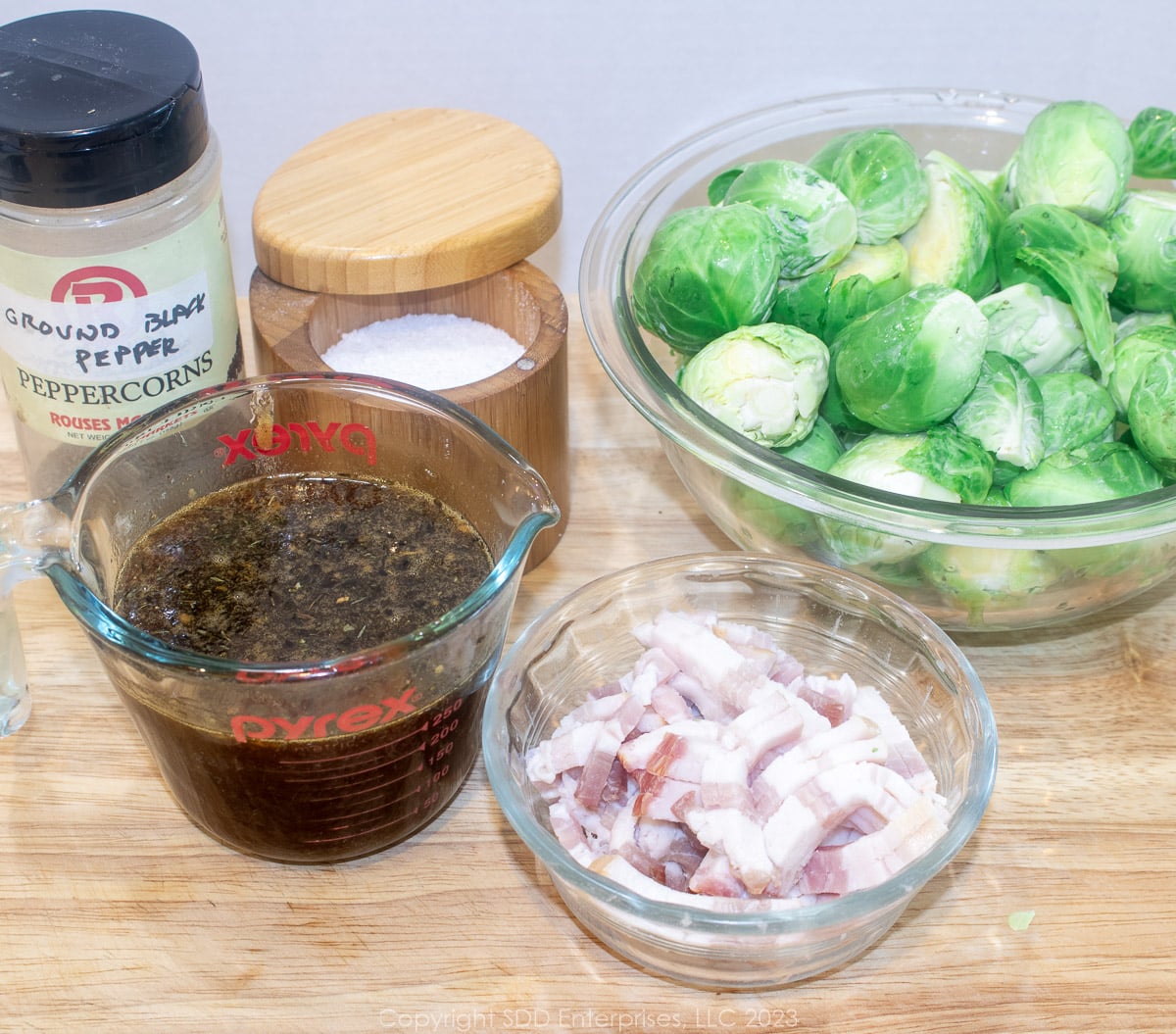 Prepared ingredients for roasting brussels sprouts.