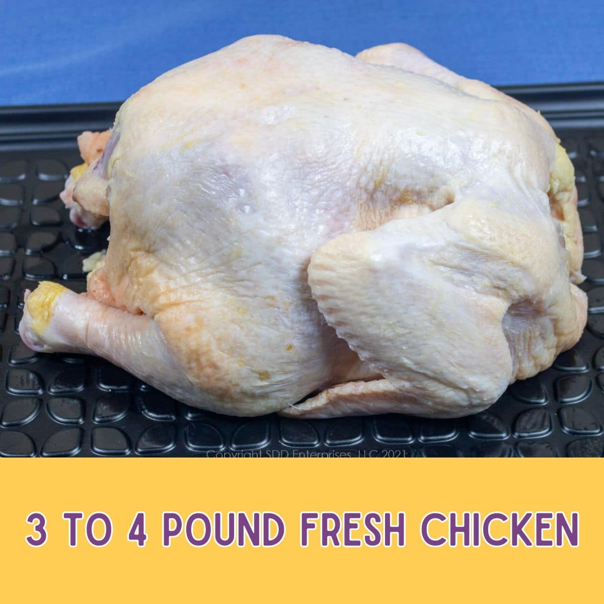 Whole chicken on a platter.