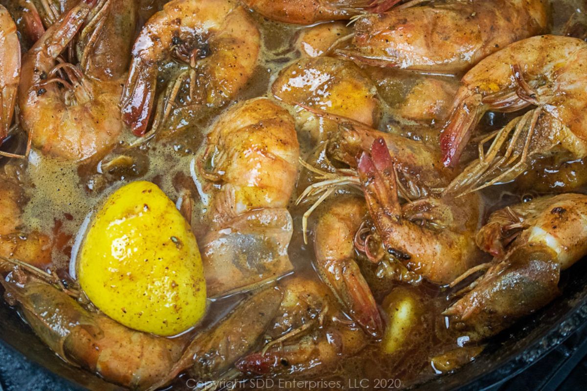 New Orleans BBQ Shrimp in a skillet.