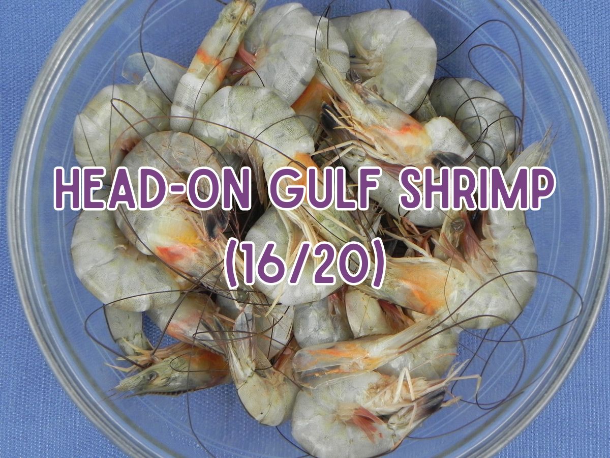 Fresh whole Gulf shrimp in a glass bowl.