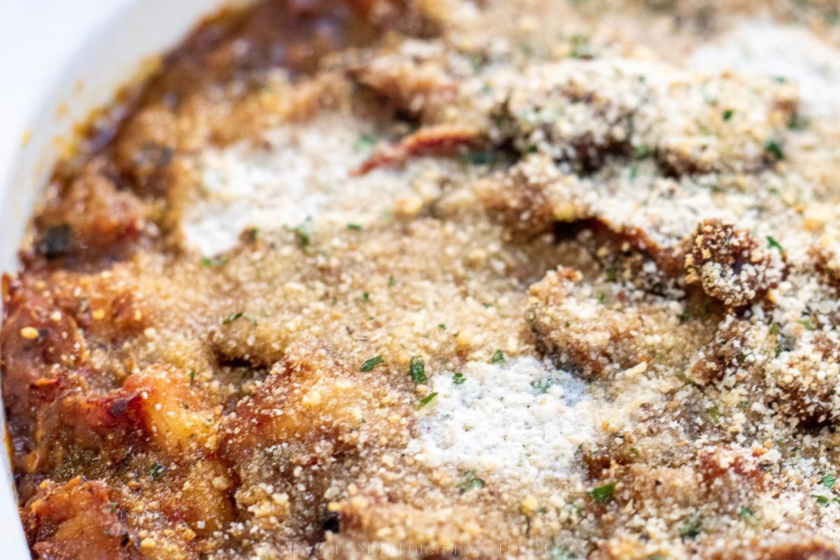 Eggplant Casserole with Shrimp in a white baking dish.