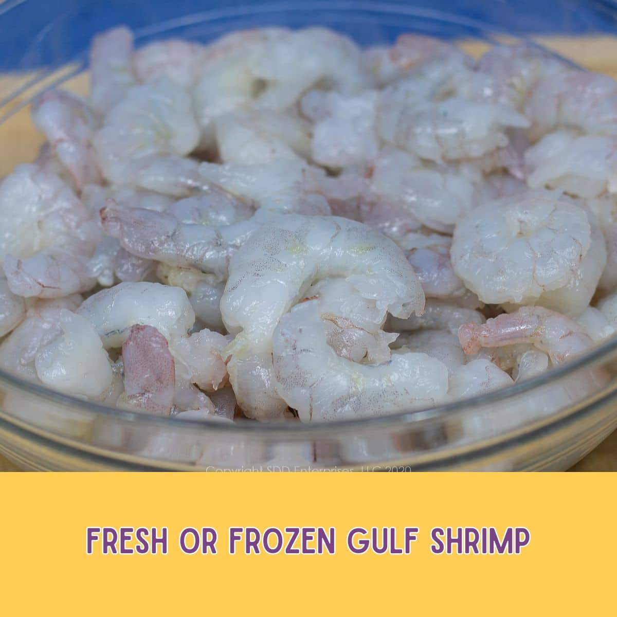 Fresh shrimp in a glass bowl.