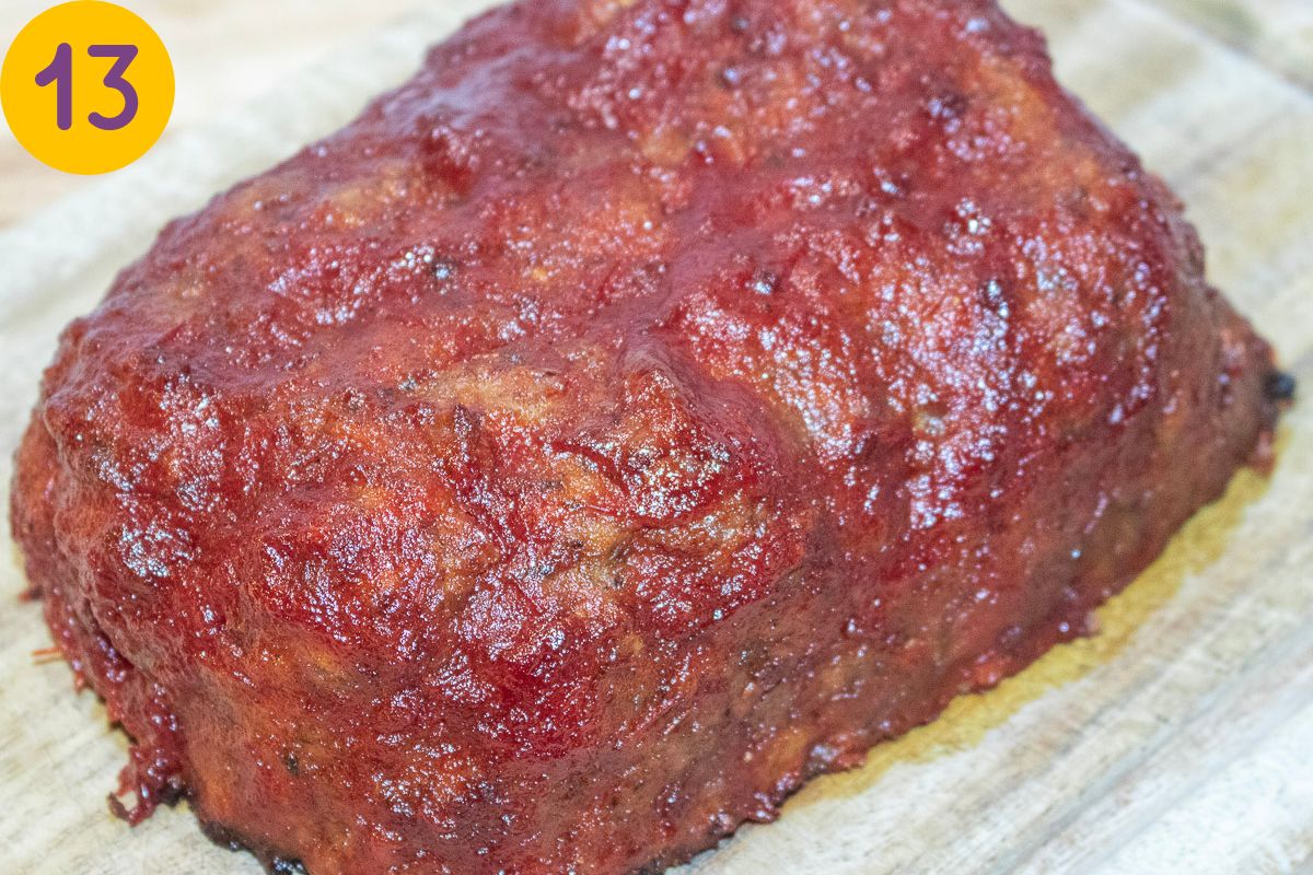 Roasted meatloaf on a cutting board.