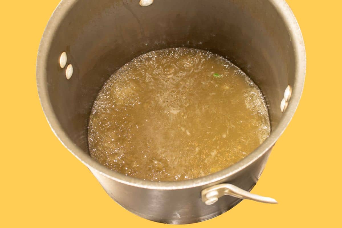 A stock pot full of stock.